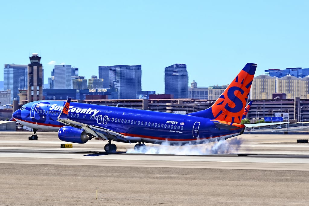 Sun Country Airlines will remove its first class seats and go with an all-coach configuration. Pictured is a Sun Country Boeing 737-800 in Las Vegas.