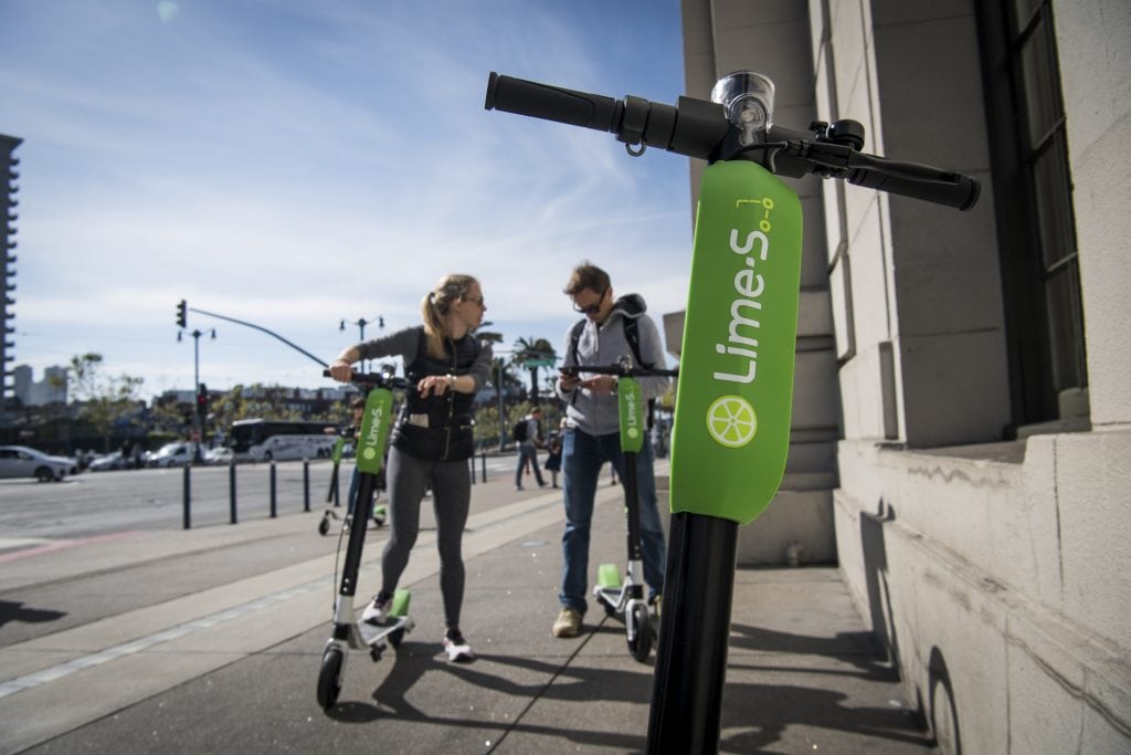 Over the last several months a handful of startups have dropped hundreds or thousands of electric scooters on the sidewalks in cities like San Francisco, Austin, and San Diego, allowing anyone who downloads an app to unlock and ride them across town for a small fee.