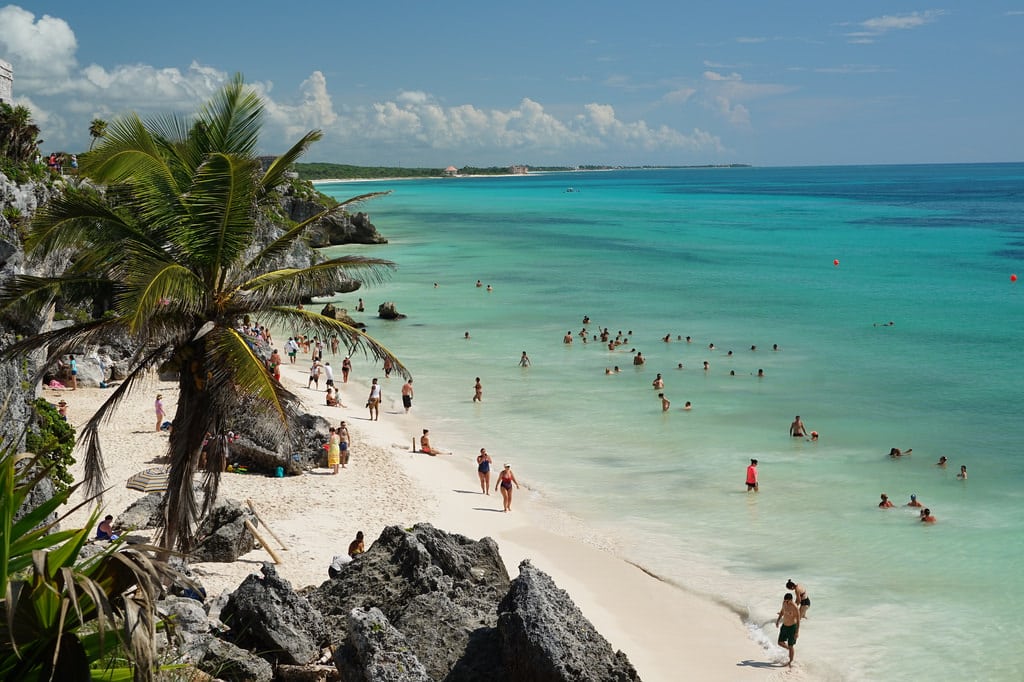 Mexico tourism officials plan to launch marketing campaigns to address negative headlines about the country. Pictured are tourists on a beach in Tulum, Mexico.