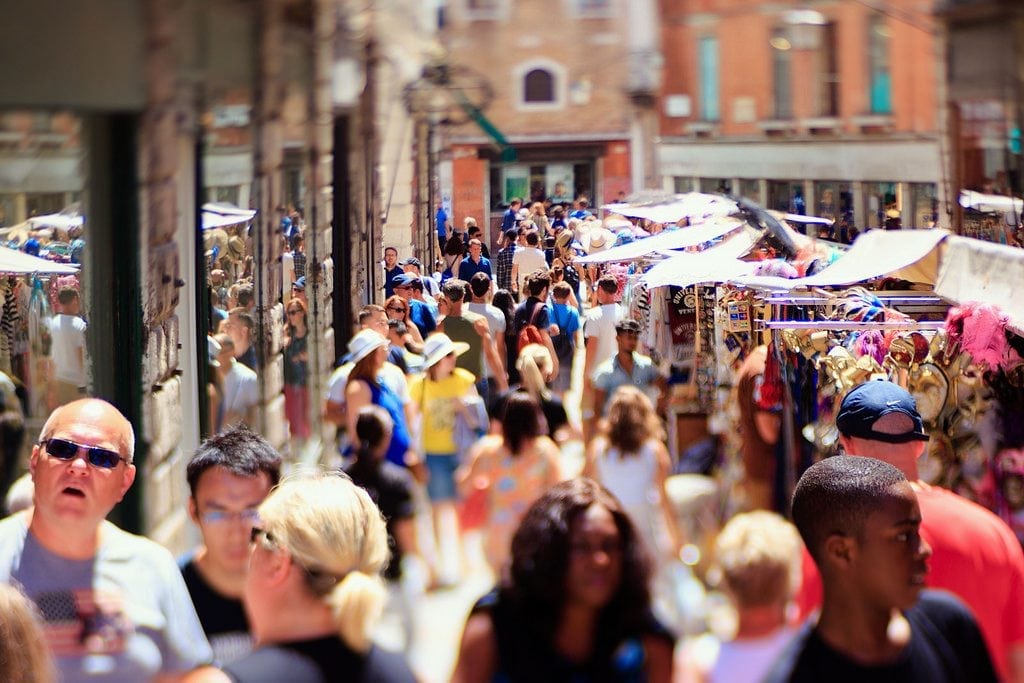Travel advisors should steer their customers away from overtouristed destinations, such as this busy street in Venice, Italy, as shown in 2016.