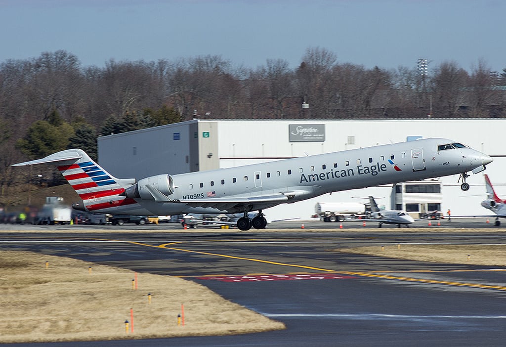 American will lose out on $35 million in pre-tax income because of computer system problems at its subsidy, PSA Airlines. Pictured is one of PSA's Bombardier CRJ700s.