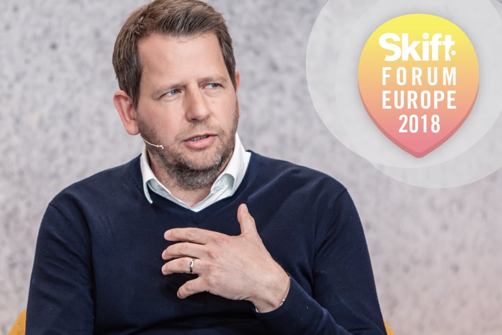 Henner Blömer, director of automotive, financial services, telecommunications, and travel in Facebook's DACH region, speaks at the Skift Tech Forum.