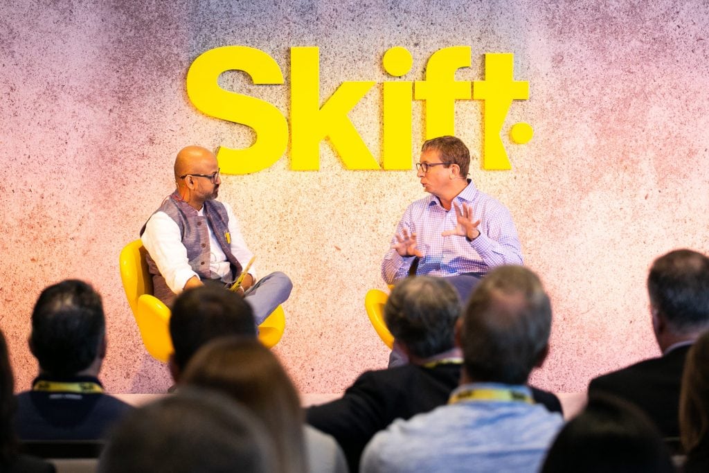 Skift Founder and CEO Rafat Ali, left, interviews Hilton Chief Commercial Officer Chris Silcock Tuesday at Skift Tech Forum.