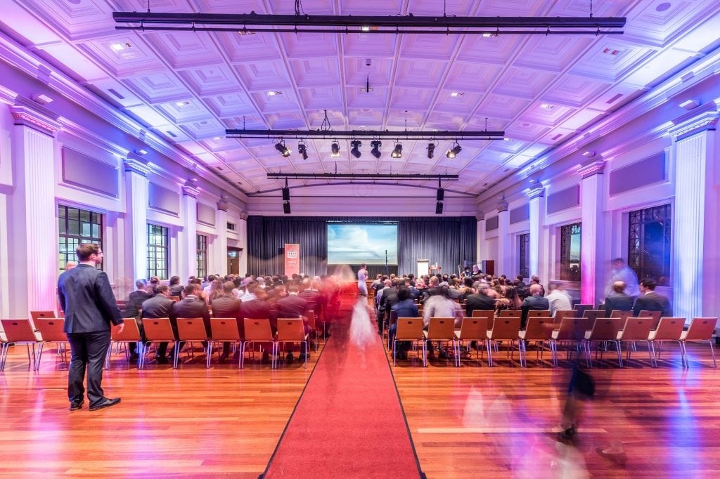 An Govhack Australia awards ceremony at Brisbane City Hall is pictured. A new report shows that small venues are embracing more varied ways for their customers to hold meetings. 