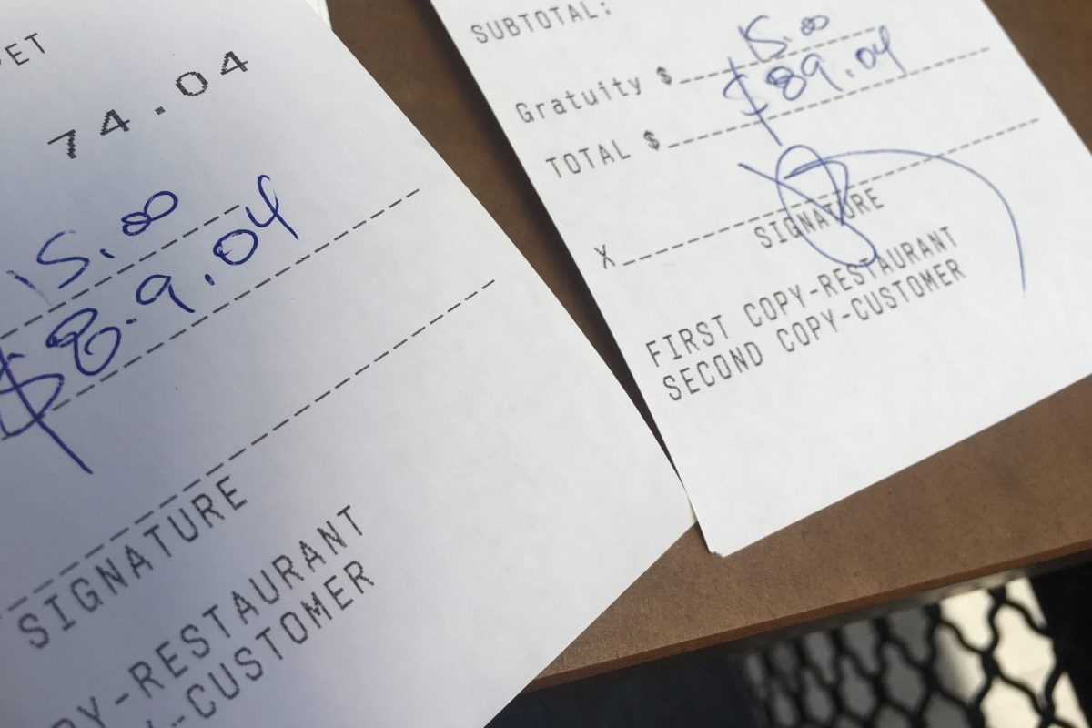 Two restaurant receipts side by side.