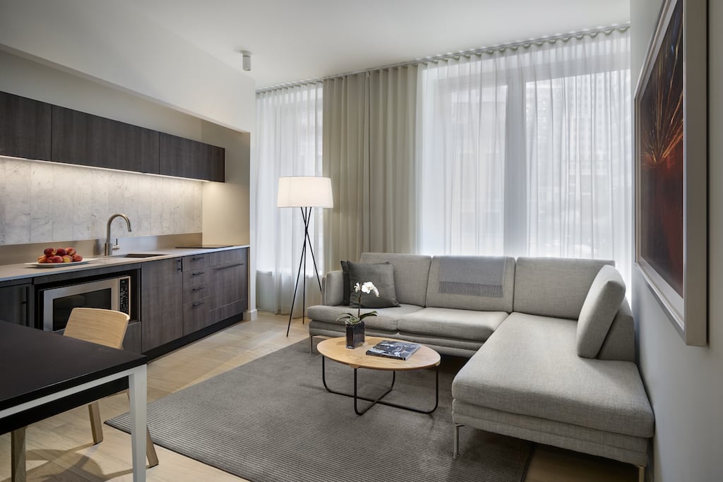 A one-bedroom suite at the AKA Wall Street. The serviced residence brand is partnering with Airbnb to build up Airbnb's inventory of more professional accommodations. 