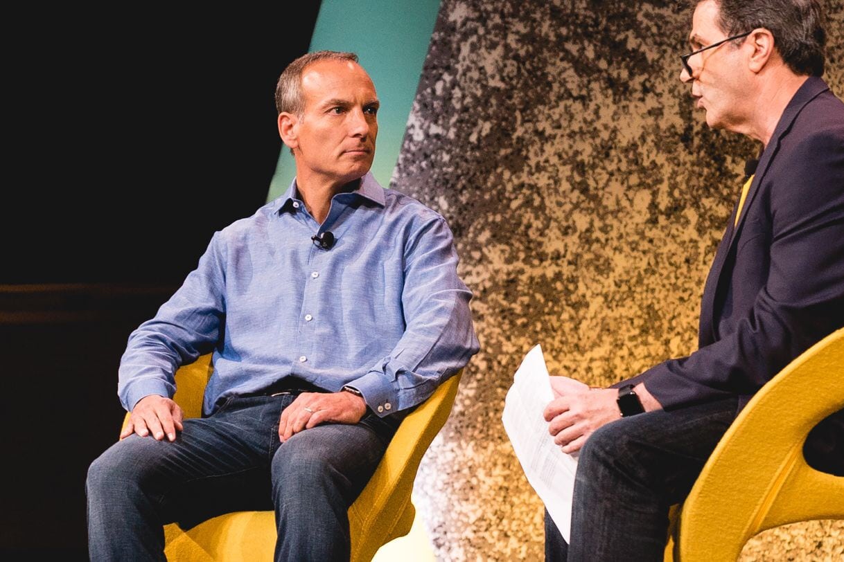Glenn Fogel (left), who was the business development and mergers guy when Priceline.com bought Active Hotels and Bookings B.V. more than a decade ago, is pictured with Skift Executive Editor Dennis Schaal at Skift Global Forum in New York City on September 26, 2017. 