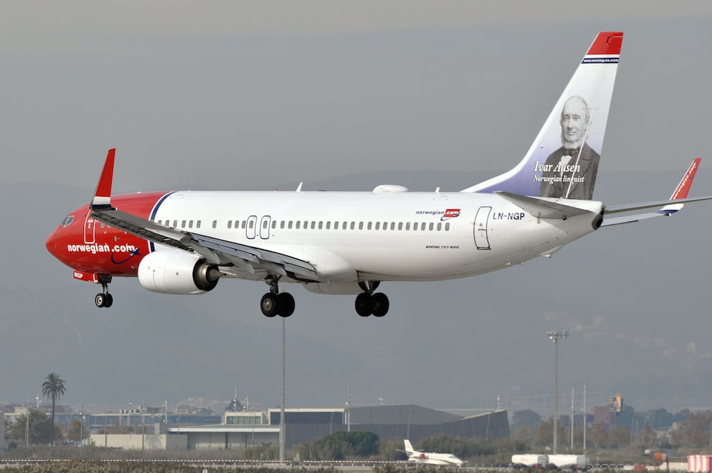 A Norwegian Air Boeing 737 lands in Barcelona. The city faces the threat of overtourism, but Norwegian is continuing to add flights.