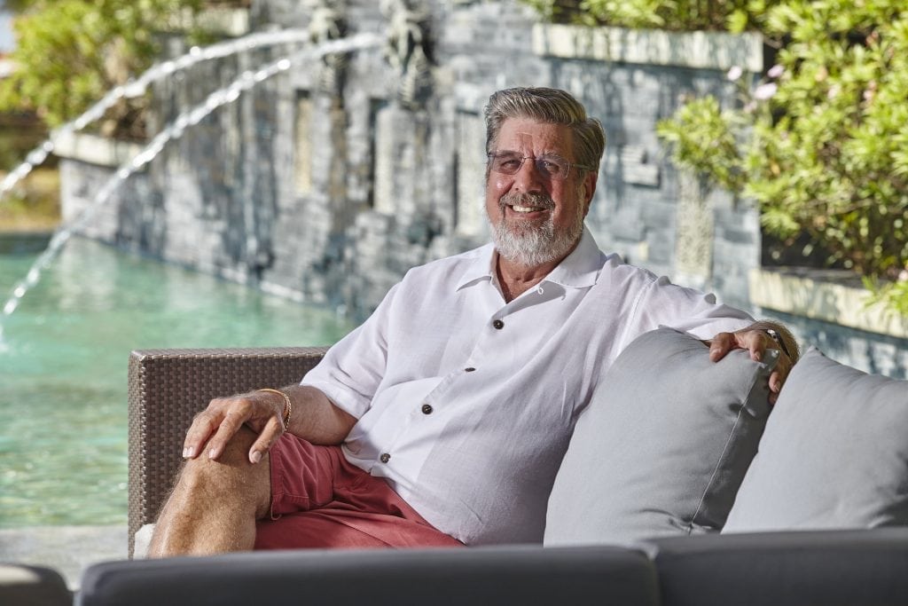 William Heinecke, the CEO of the Minor Hotels Group, lounging at one of the hotel chain's properties. 