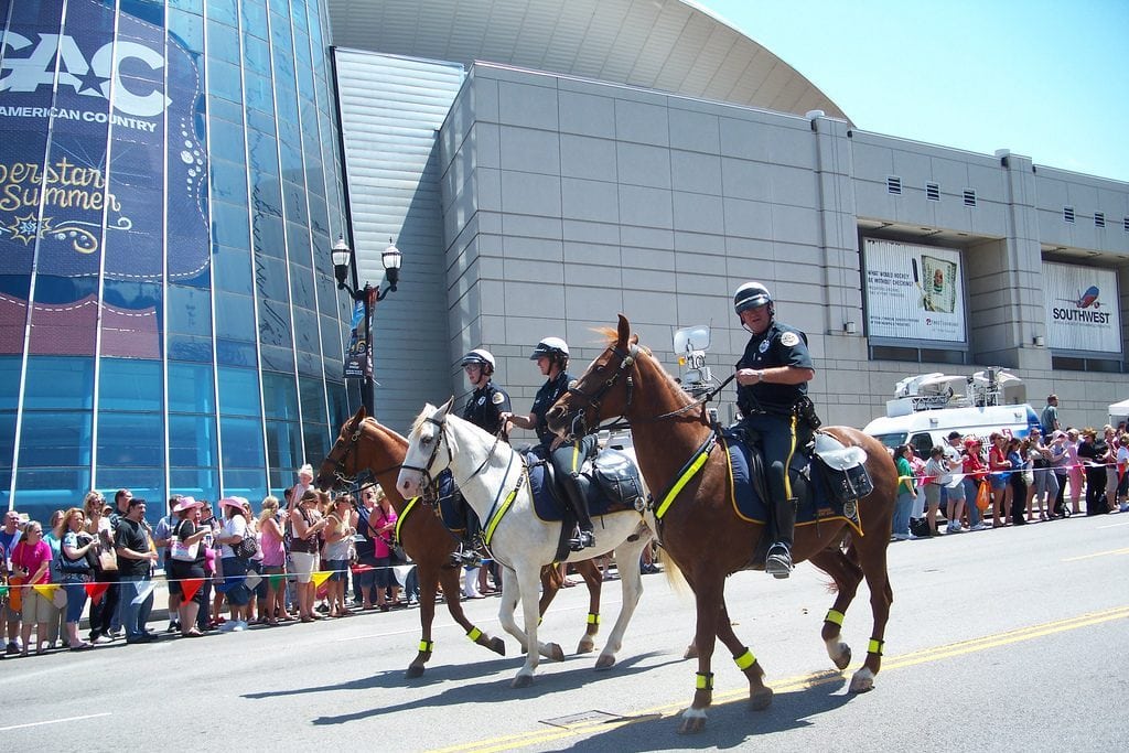 Nashville's tourism board is increasingly helping the local police department during large events it organizes. Pictured are mounted police in Nashville.