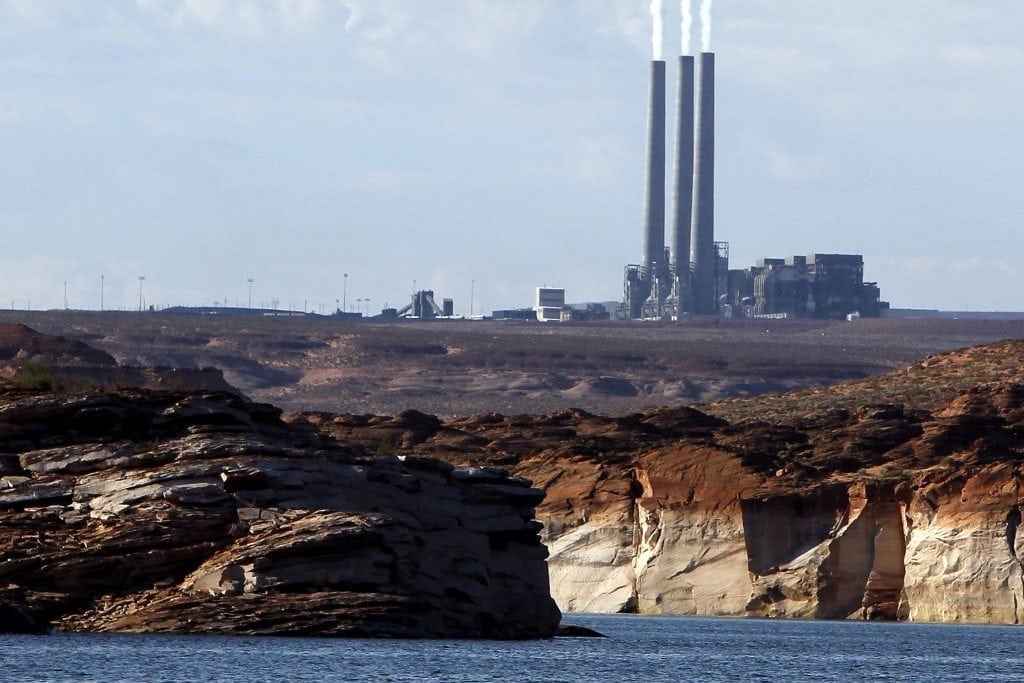 A new study concludes visitors may be steering clear of some U.S. national parks or cutting their visits short because of pollution. Pictured is a Sept. 4, 2011 file photo of the main plant facility at the Navajo Generating Station northeast of Grand Canyon National Park as seen from Lake Powell in Page, Ariz. 