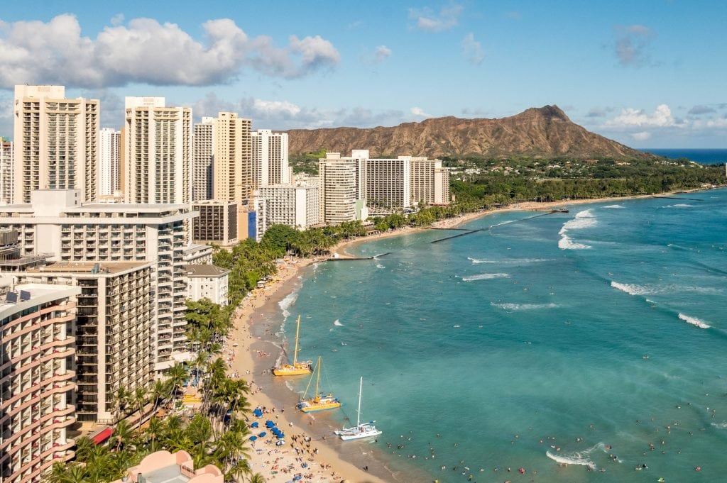 Online travel agencies make many hotels and tours and activities, such as those in Honolulu, shown here, available to book online. 