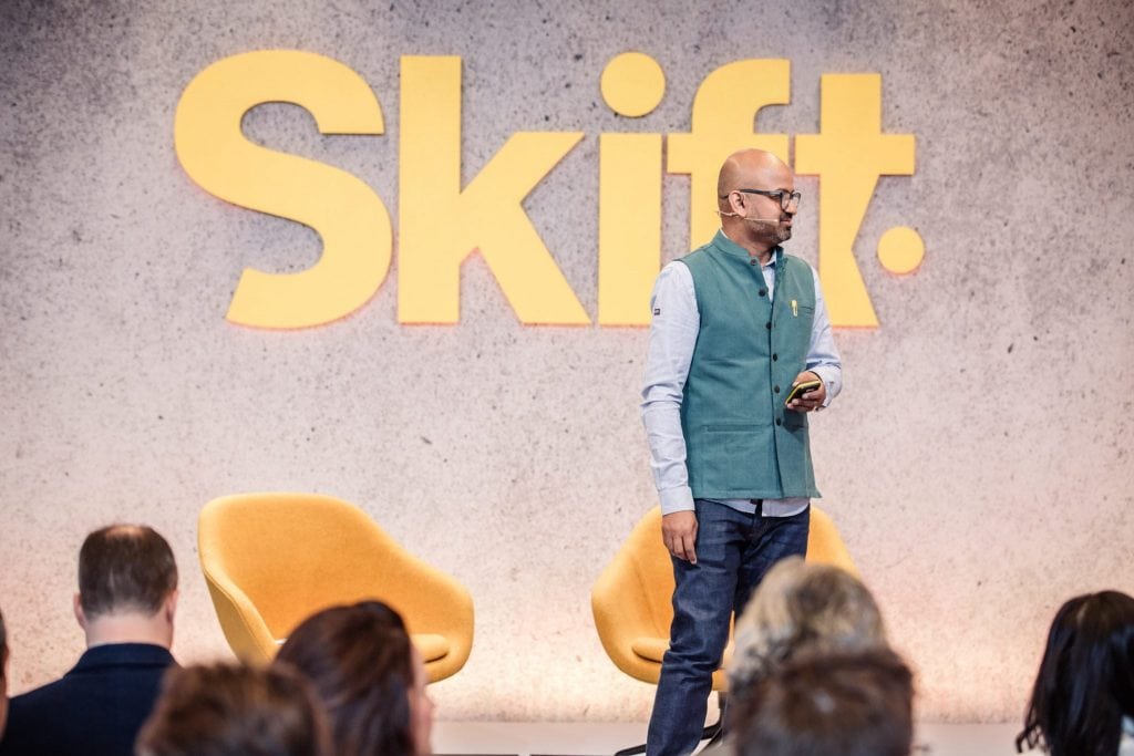 Skift Founder and CEO Rafat Ali addressing a packed house at a recent Skift Global Forum.