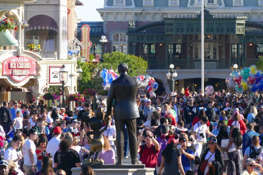 Crowds are shown at the Magic Kingdom in March. Walt Disney World is changing the way tickets are sold to try to even out demand.