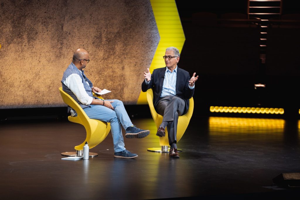 Hyatt Hotels CEO Mark Hoplamazian (right) and Skift founder and CEO Rafat Ali speaking on stage at Skift Global Forum in New York City on September 27, 2018.