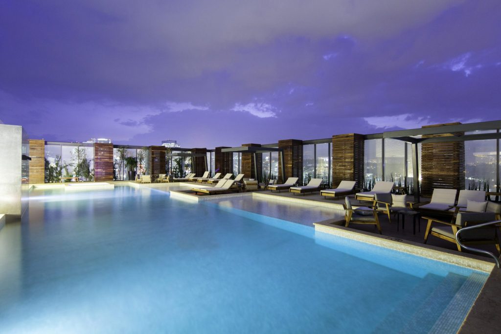 The rooftop pool at a Hilton in Mexico City. Hilton is growing its portfolio of all-inclusive resorts. 