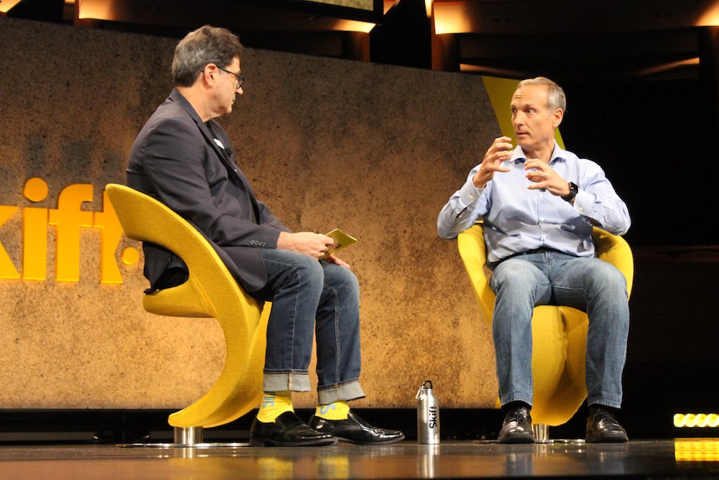Booking Holdings CEO Glenn Fogel, right, at Skift Global Forum 2018.