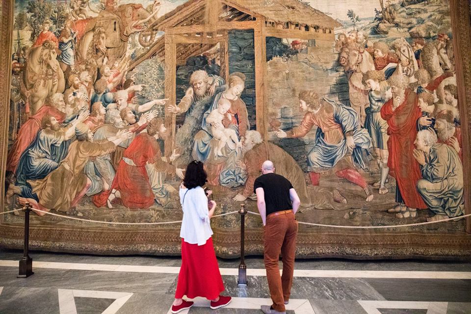 Travelers participate in a Vatican museum tour before it normally opens to the general public. TripAdvisor is enabling travel agents to book tours such as this through a new travel agent website.
