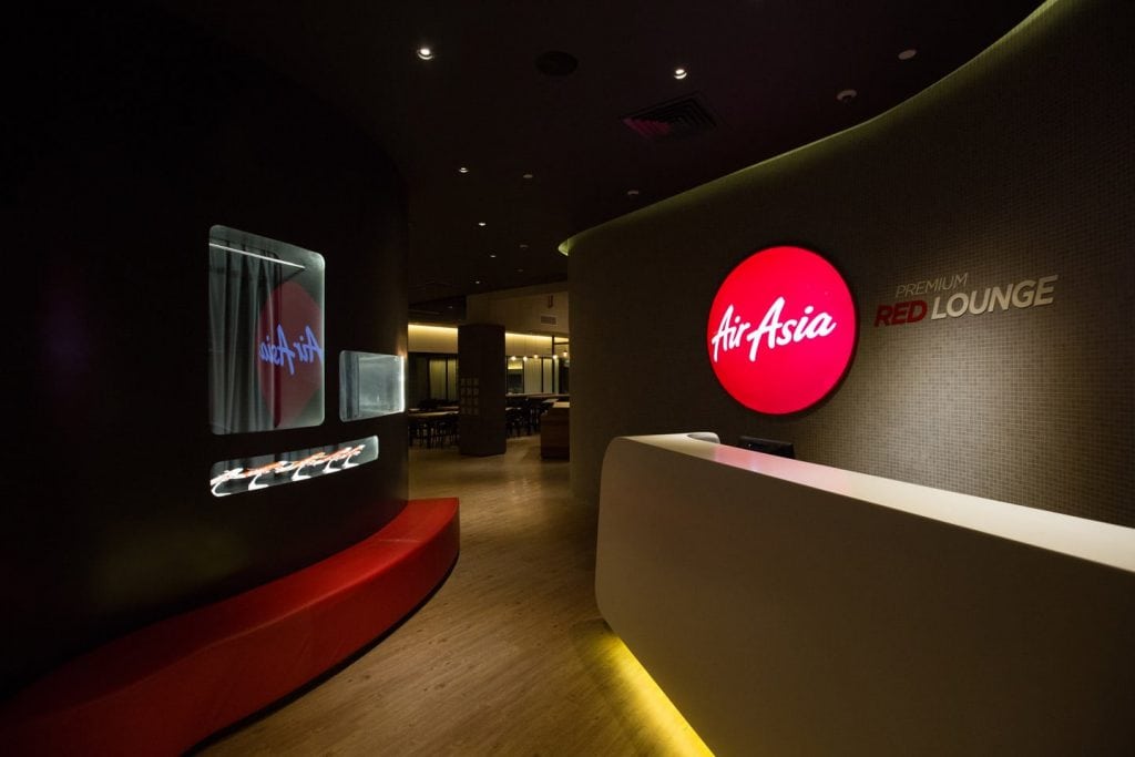 The photo is of an AirAsia lounge. The airline is trying to become a lifestyle brand, and a booking site for hotels, and tours and activities.