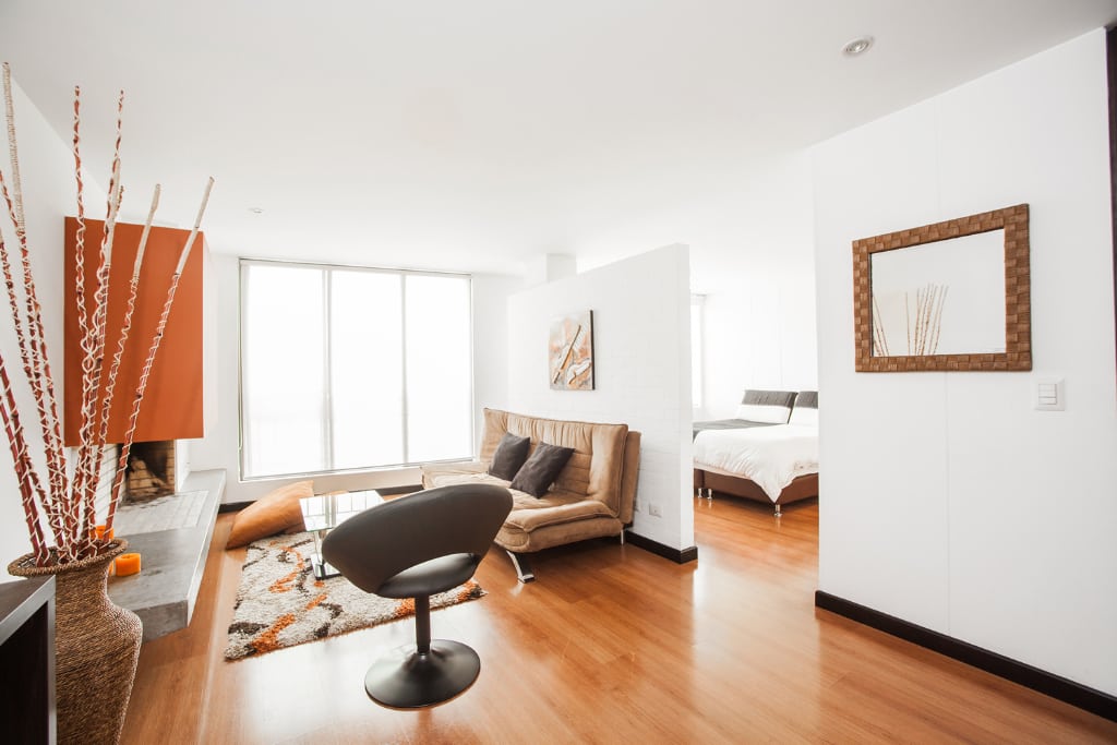 Shown here is a studio apartment by Berna Boulevard in Bogotá, Colombia, that is available for rent through Oasis Collections, which said Tuesday it had been acquired by vacation rental tech company Vacasa.