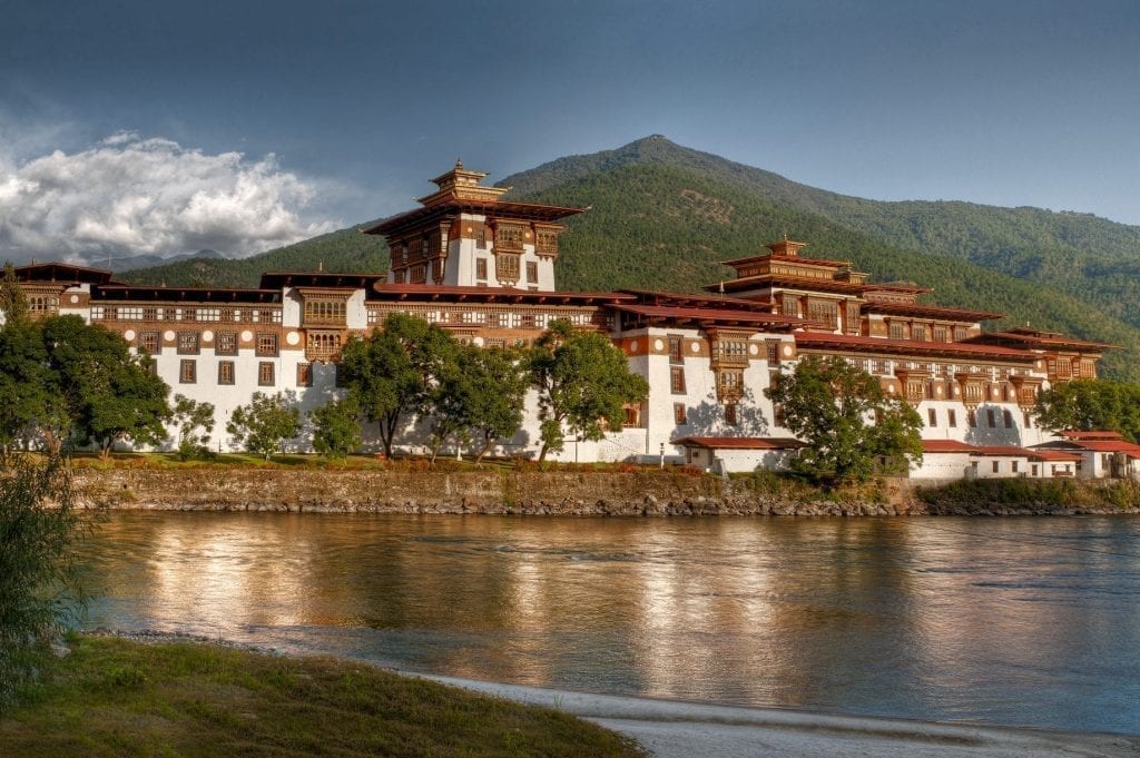 The Punakha Dzong in Bhutan. Booking travel to more far flung destinations such as Bhutan is where travel advisors have come into their own. 