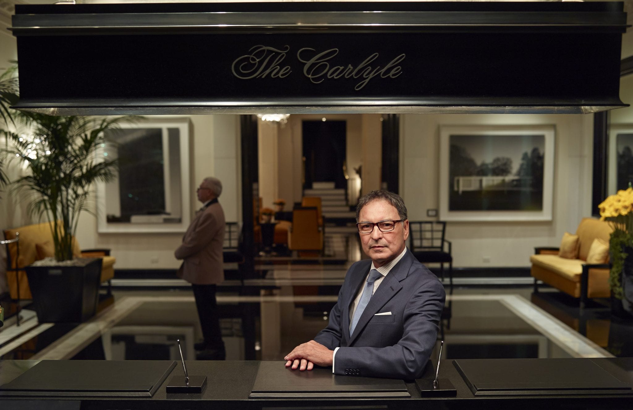 Hector Ruiz, a 27-year veteran of The Carlyle, seated in the lobby of the hotel.