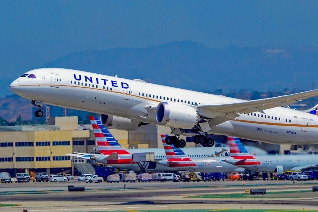 United and American Airlines jets are pictured at Los Angeles International Airport in this photo from 2017. United is threatening to remove some of its flights from Expedia.