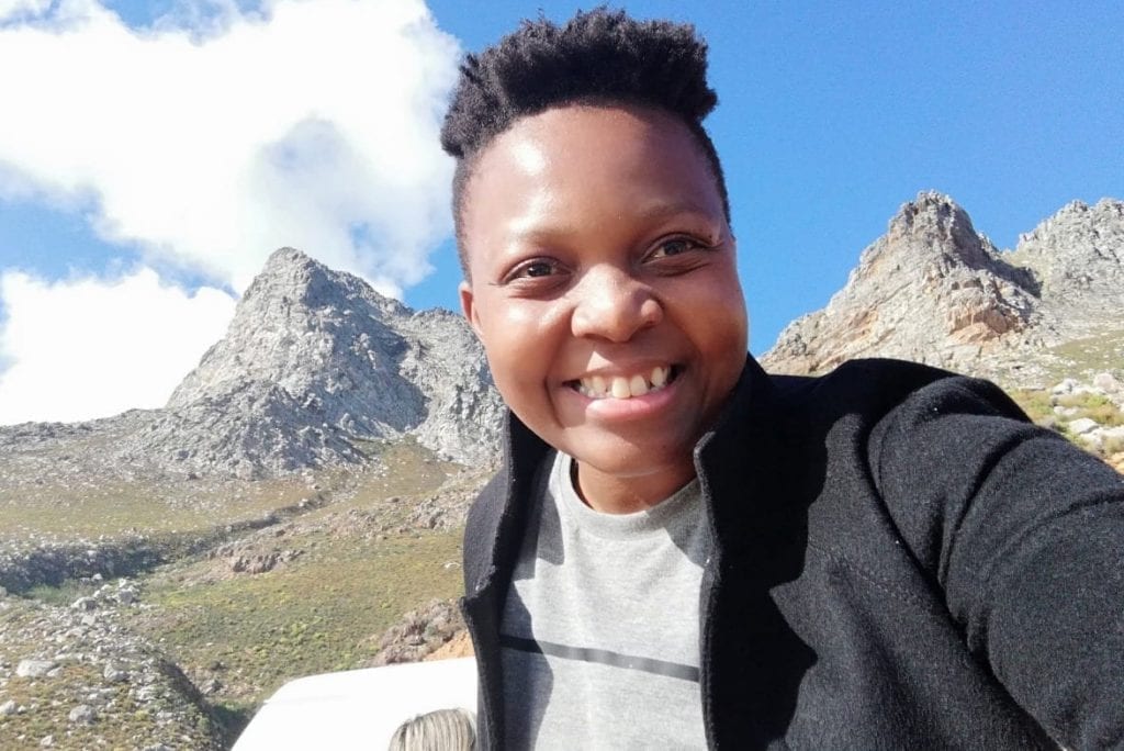 Traveling Cheapskates co-founder Pearl Nkosi is shown at Table Mountain National Park in South Africa.