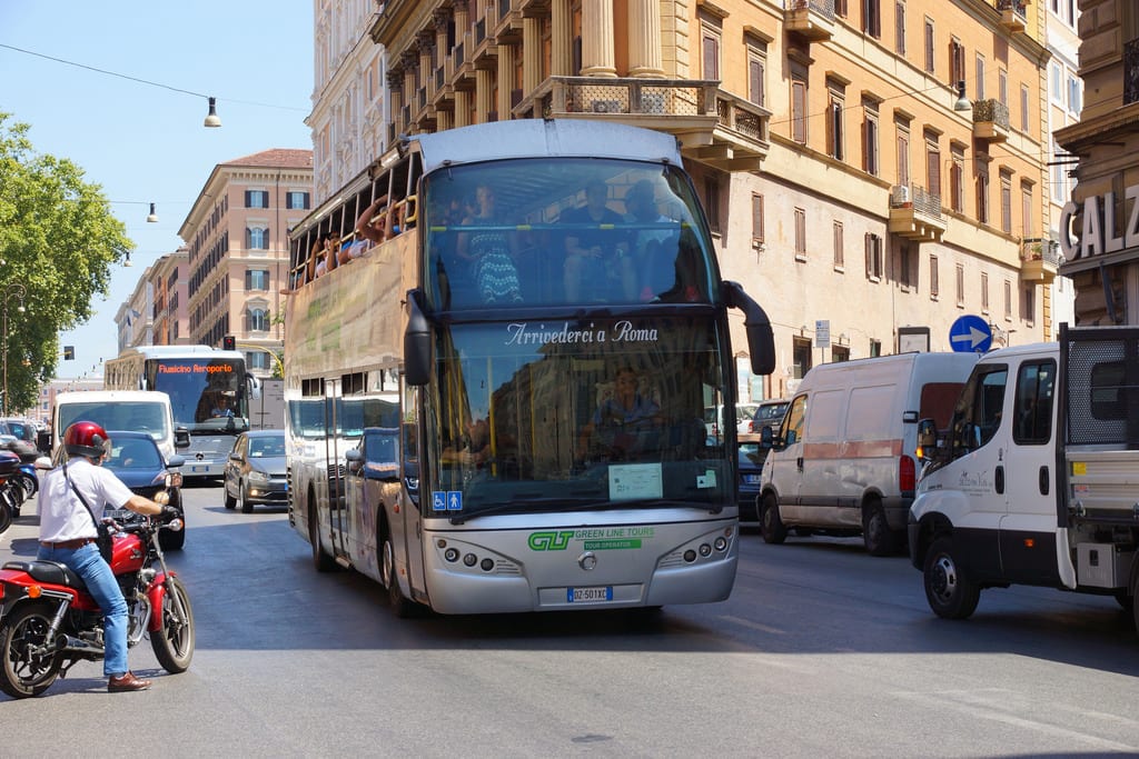 Starting January 1, Rome is placing strict regulations on tour buses that want to enter the city. Pictured is a sightseeing tour bus in Rome.