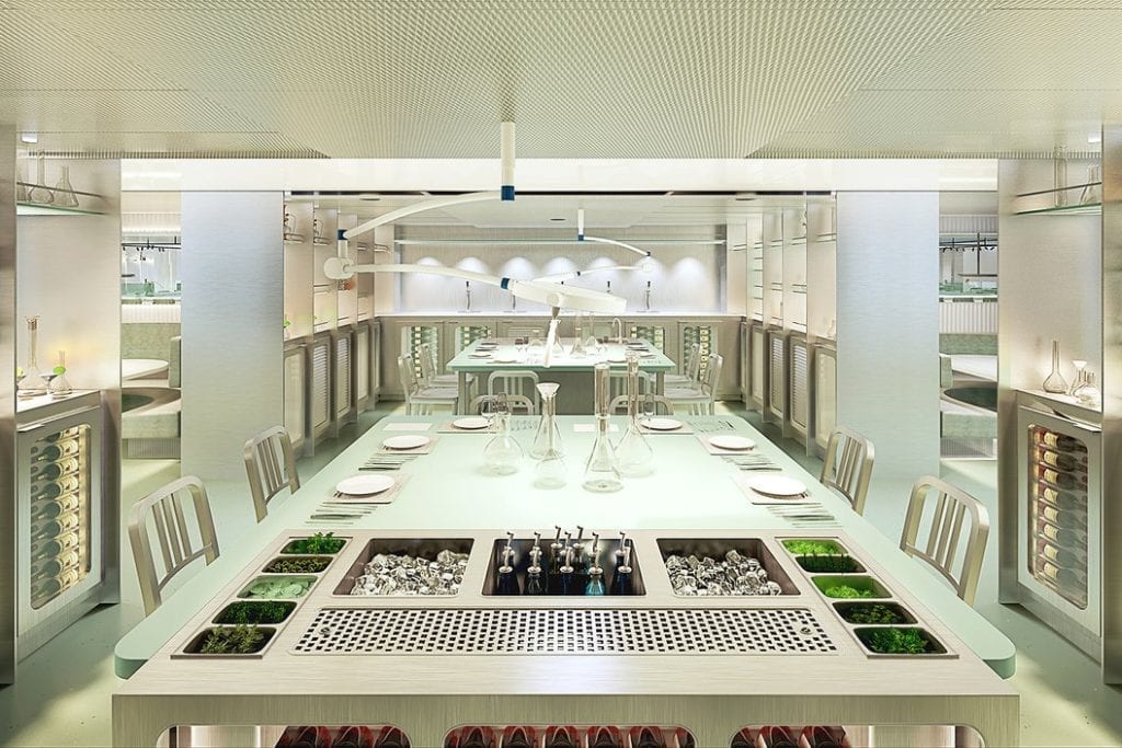 A view of The Test Kitchen, a place on the first Virgin Voyages cruise ships where guests are treated by chefs to epicurean delights via plated meals. Skift predicts that in 2019 cruise ships may experiment with alternatives to the traditional buffet meal service.