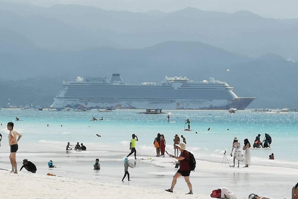 Genting Cruises' MS World Dream drops anchor off Boracay last December 16. Local stakeholders believe the island derives no economic benefit from cruise ships. Photo courtesy of Christine San Diego.
