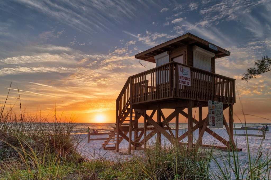 Sunset is shown on Florida's Coquina Beach in this photo from April 2018. The state saw its number of visitors increase, but overseas tourists continued to drop.