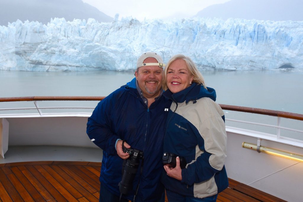 David Porter and Carol Porter on a Crystal Cruises sailing in front of the Hubbard Glacier on the way to Anchorage, Alaska in May 2016.