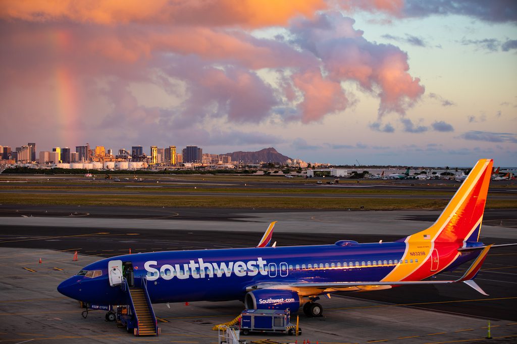 Southwest Airlines will begin flying to Hawaii later this year, in part because it hopes to boost sign-ups for its co-branded credit card. Pictured is a Boeing 737 on the ground in Honolulu. 