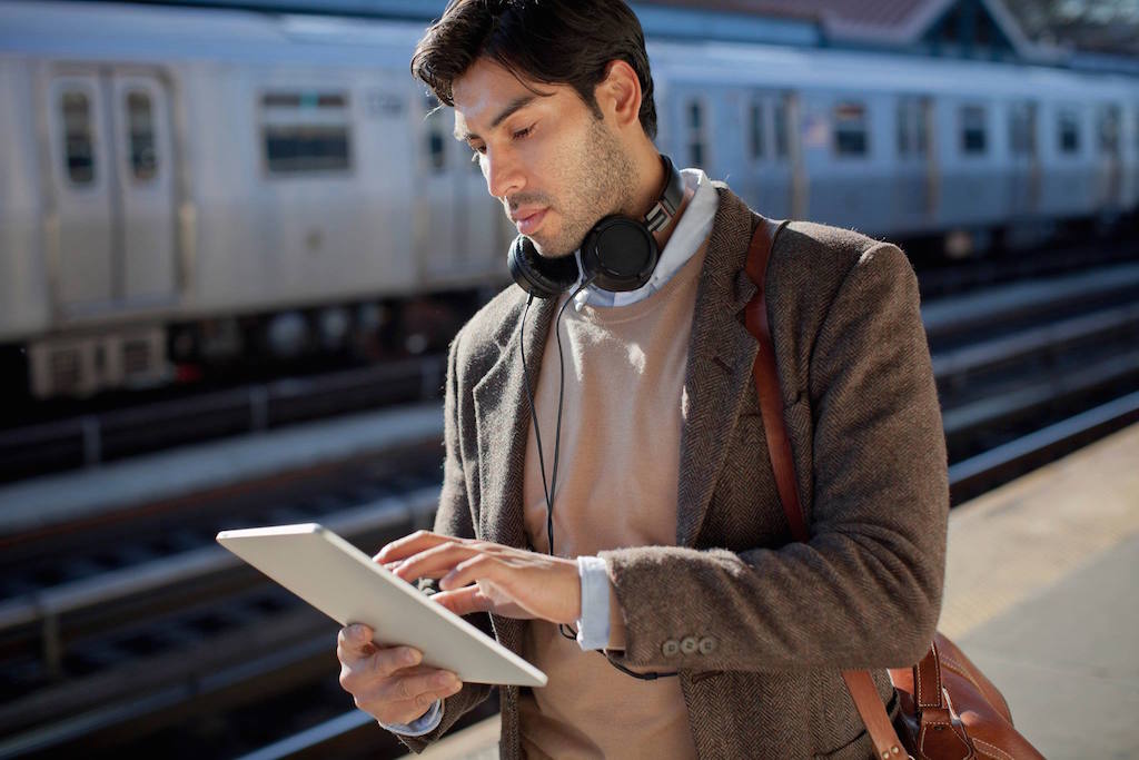 A promotional photo of a man using Concur on his iPad. Sector leader SAP Concur might be getting some competition from recently-merged Certify and Chrome River. 