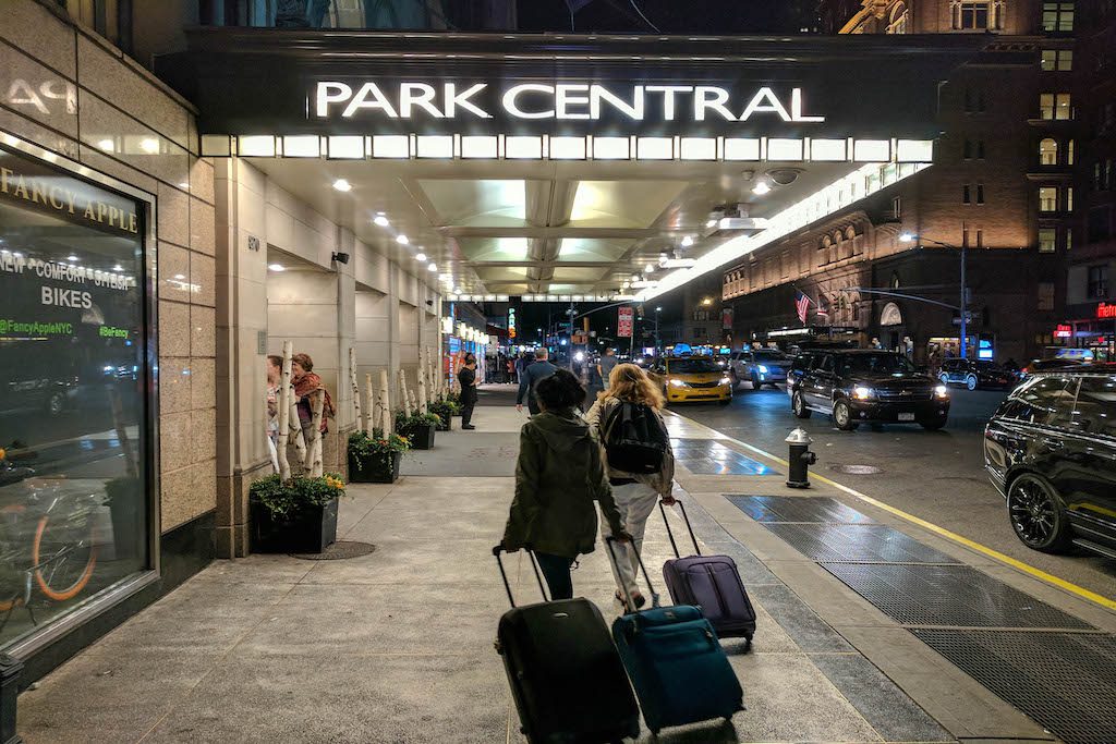 Travelers entering the Park Central Hotel in New York City.