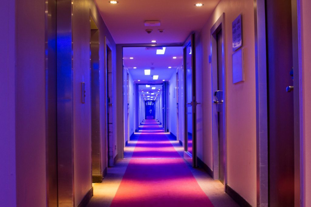 Hotel hallway with blue lights