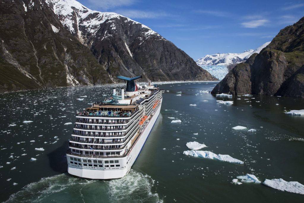 The Carnival Miracle in Alaska. Both  Carnival and Norwegian Cruise Line have been fined for multiple environmental violations in Alaskan waters.