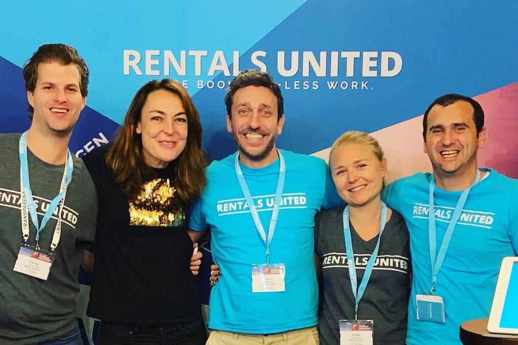 Shown here are members of the Rentals United startup. James Burrows, CEO, is in the middle. Co-founder Vanessa de Souza Lage is to the left of him. Rentals United, which provides a tech platform for vacation rental property managers, has raised $4.25 million. 
