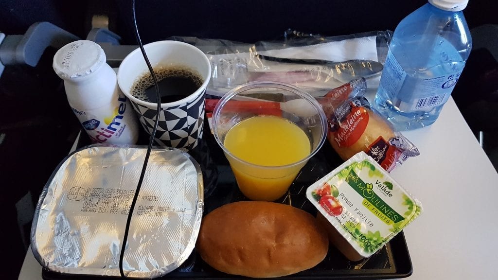Airplane food with lots of plastic