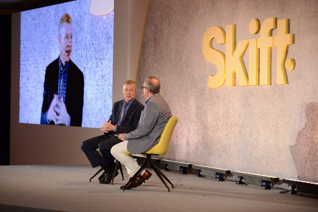 United Airlines President Scott Kirby (left) spoke with Skift Editor-in-Chief Tom Lowry at Skift Forum Asia in Singapore May 27. Kirby vows to take on low-cost carriers in a more aggressive way.