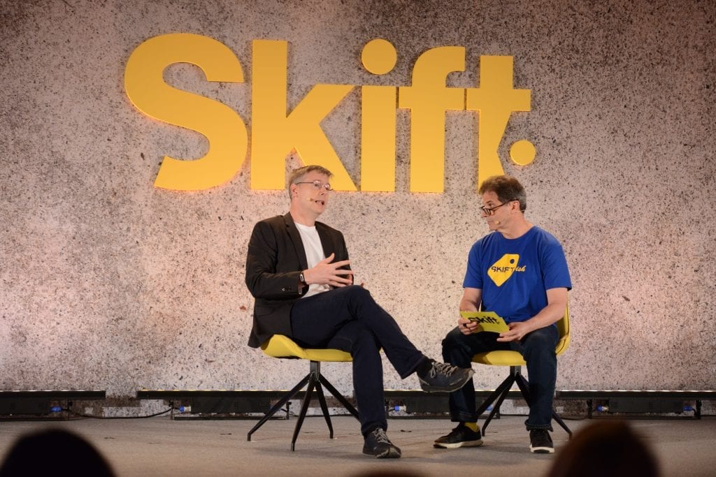 Agoda CEO John Brown speaking with Skift Executive Editor Dennis Schaal at Skift Forum Asia in Singapore on May 27, 2019. Brown likened online travel in Asia to Game of Thrones.