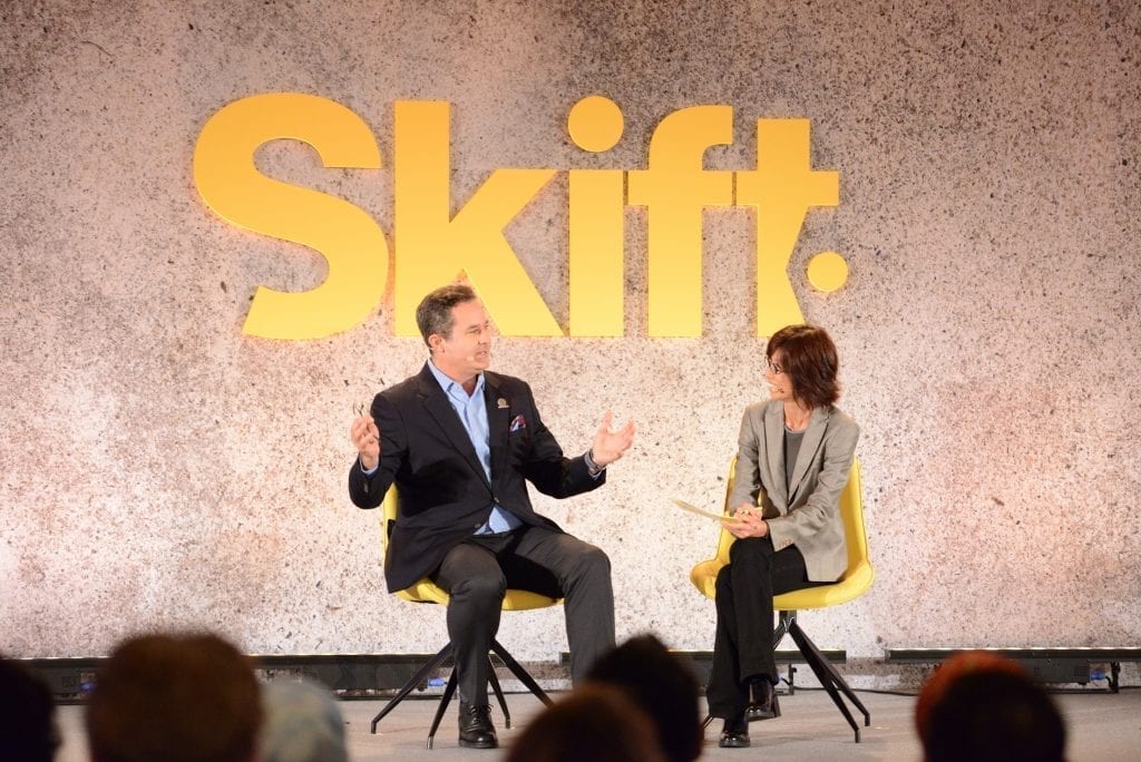 Genting's Thatcher Brown with Skift's Asia Editor Raini Hamdi at Skift Forum Asia 2019 in Singapore.