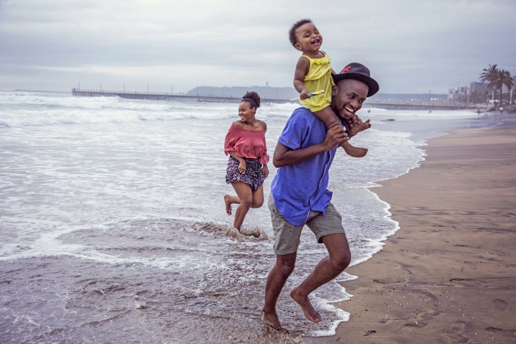 A family at a South African beach in KwaZulu-Natal province. The Expedition is a new subscription-based, online club of people sharing tips about family travel. It's founded by Sara Clemence and Ryan Sager.