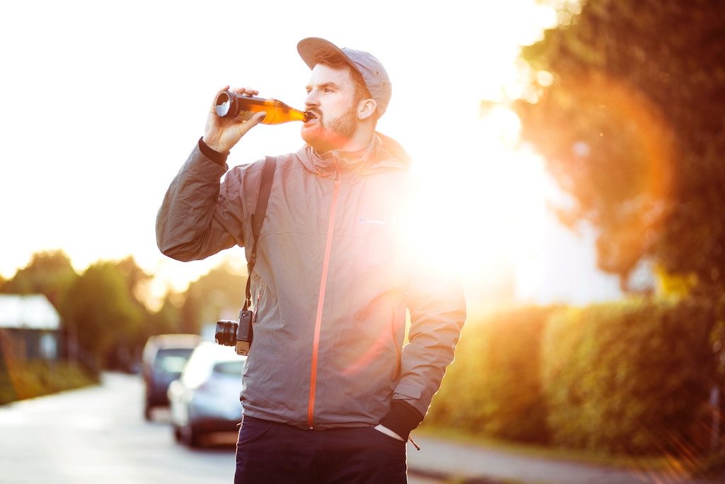  A man is shown drinking a beverage. Wellness beverage brands are contending with new rivals entering the space.
