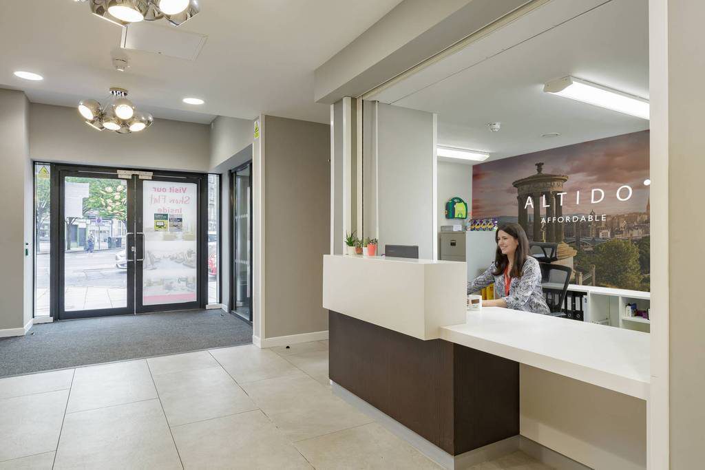 The reception area for an aparthotel in Edinburgh, UK, run by Altido. Four European short-term rental property management companies, BnbBuddy, The London Residents Club, Hintown, and RentExperience, have merged to form Altido, a broader operation and brand.