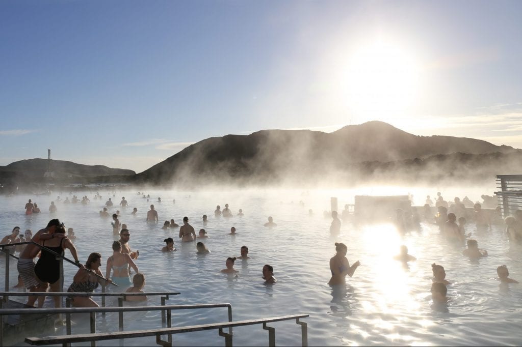 Visitors at the Blue Lagoon in Iceland, a popular tourist site. The country has seen a decline in international arrivals so far this year.