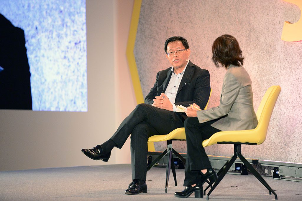 Fosun Tourism Group CEO Qian Jiannong speaking with Skift Asia Editor Raini Hamdi at Skift Forum Asia on May 27, 2019. Qian said he remains keen on Fosun's investment in Thomas Cook. 