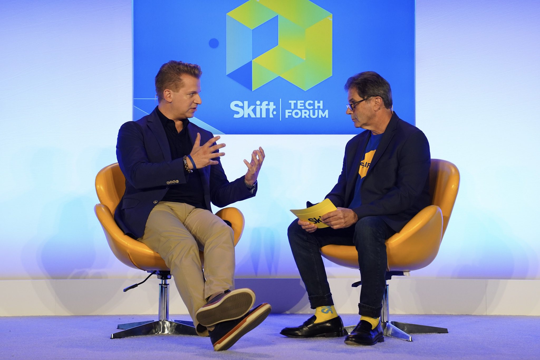 Oliver Heckmann of Google, left, speaks with Skift Executive Editor Dennis Schaal on May 27, 2019 at Skift Tech Forum. Heckmann said he is bullish on machine learning. 