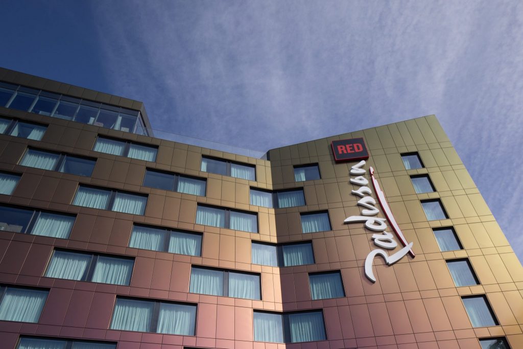 The exterior of the Radisson Red hotel in Glasgow, Scotland. The parent company is planning to launch a co-branding pilot in Europe with new owner Jin Jiang.